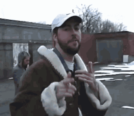 a man wearing a nike hat and a fur coat