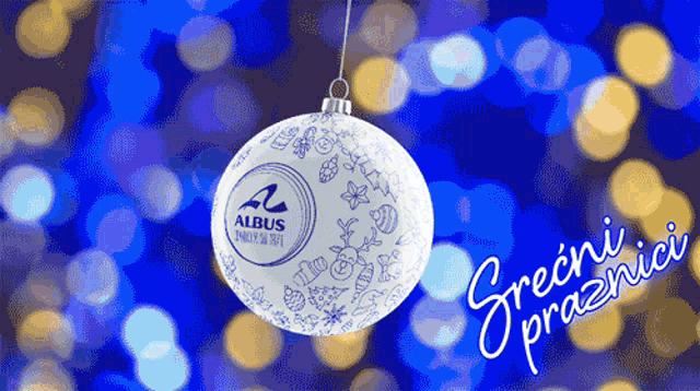 a christmas ornament with the word albus on it hangs from a string