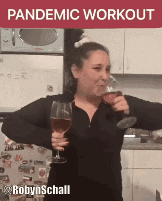 a woman drinking a glass of wine with the words pandemic workout behind her