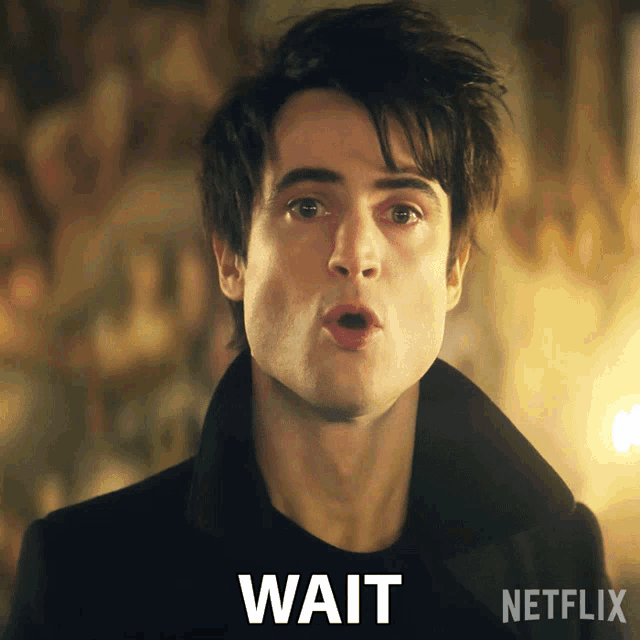 a man with a surprised look on his face is next to the word wait on netflix