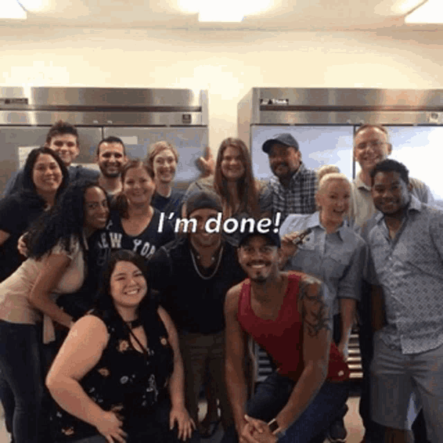 a group of people posing for a picture with the words i 'm done behind them
