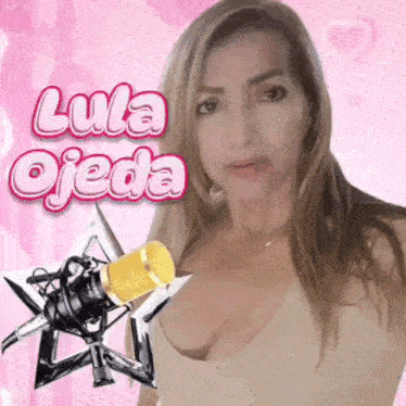 a woman is standing next to a microphone with the name lula ojeda on the bottom