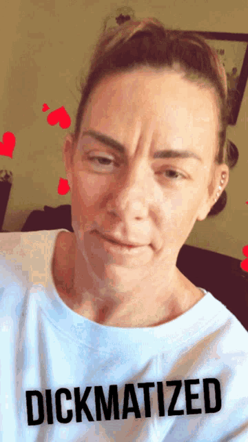 a woman wearing a shirt that says dickmatized on it