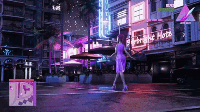 a woman in a purple dress is standing in front of a starlight hotel