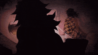 a silhouette of a man with a sword standing next to another man