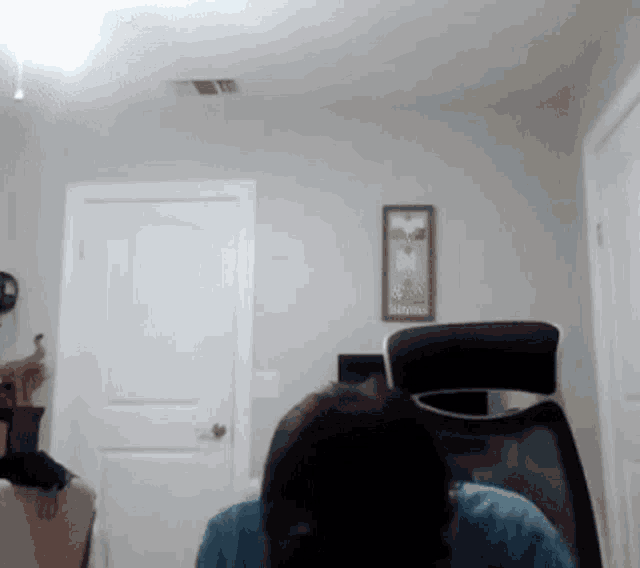 a room with a picture on the wall that says ' survival ' on it