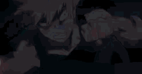 a close up of a person 's face with a blue light coming out of their mouth .