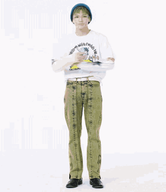 a man wearing a shirt that says global community on it