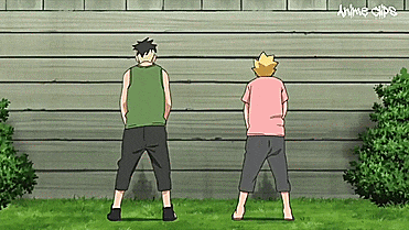 a couple of anime characters standing next to each other
