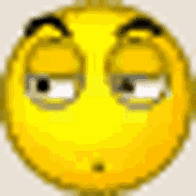 a close up of a yellow smiley face with a serious look on its face .