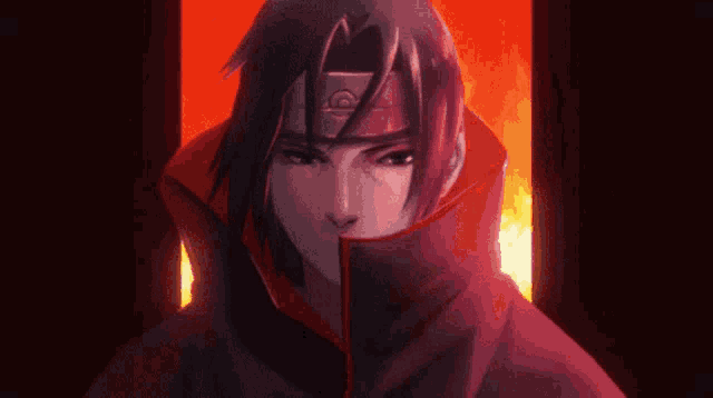 a close up of a person wearing a red cape and a red headband