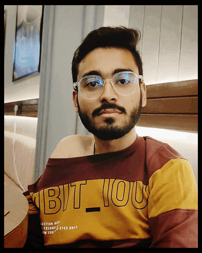 a man wearing glasses and a shirt that says ' but you ' on it
