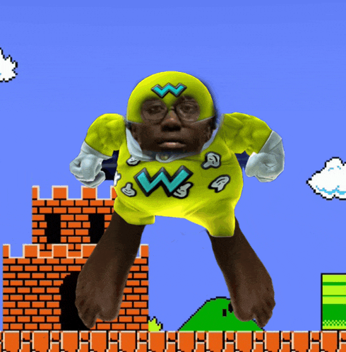 a man in a yellow superhero costume with the letter w on it is flying through the air