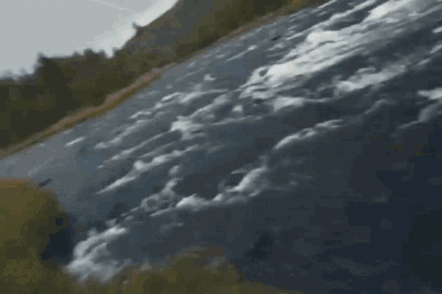 a close up of a river with a lot of waves