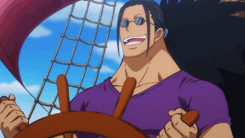 a man wearing sunglasses and a purple shirt is holding a steering wheel
