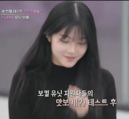 a girl with korean writing on the bottom right corner