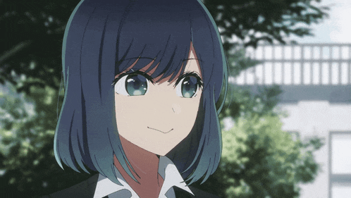 a girl with blue hair is wearing a white shirt
