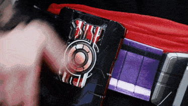 a black and purple belt with a red cape and the word rise on it