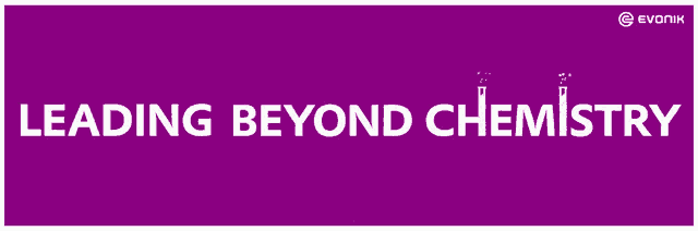 a purple sign that says " leading beyond chemistry " on it
