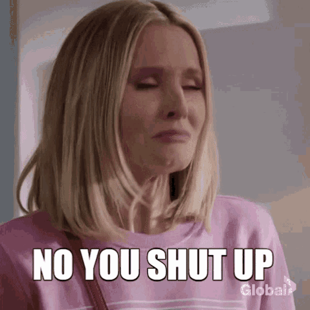 a woman in a pink sweater is crying and saying `` no you shut up '' .
