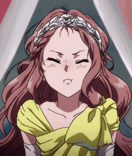 a girl wearing a tiara and a yellow dress is making a funny face