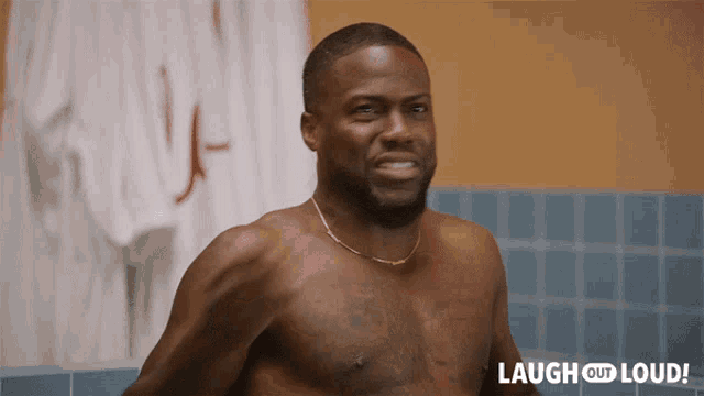 a shirtless man in a bathroom with laugh out loud written on the bottom right