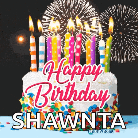 a birthday cake with candles and fireworks in the background for shawnta .