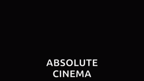 a black and white photo of a man with glasses and the words absolute cinema