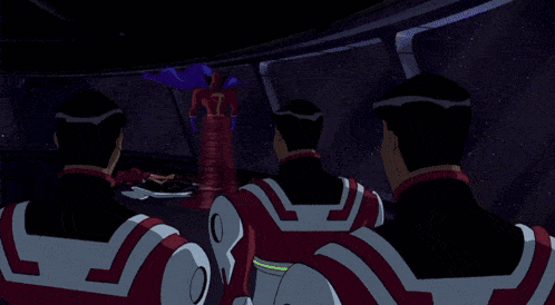 a group of superheros are standing in a tunnel