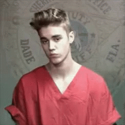 Uh Oh GIF - Justin Bieber Mugshot Jail GIFs