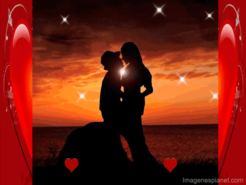 a silhouette of a man and woman kissing in front of a sunset