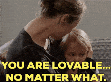 a woman holding a child with the words " you are lovable no matter what " on the bottom