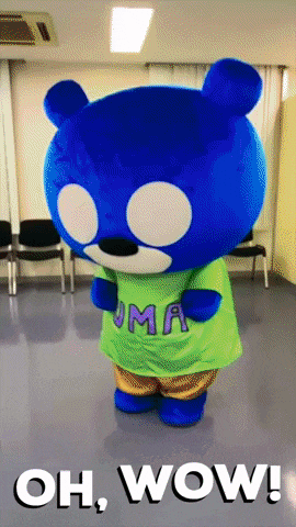 a blue teddy bear wearing a green shirt with the word oma on it
