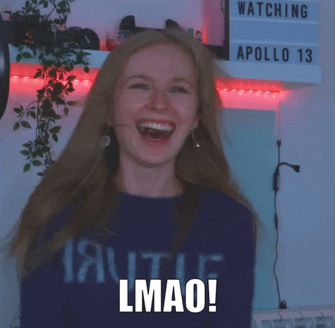 a woman is making a funny face in front of a sign that says " watching apollo 13 "