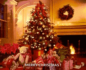 a christmas tree with gifts underneath it and a teddy bear in front of it .