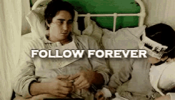 a man is laying in a hospital bed with a mask on his head and the words follow forever written above him .