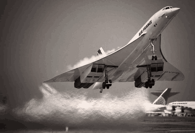 a large air france plane is taking off from an airport