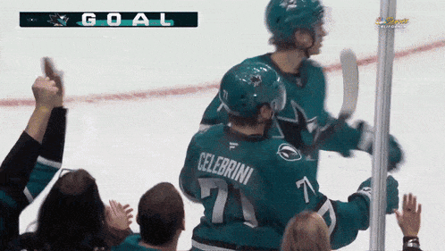 a hockey player with the name celebrini on his back