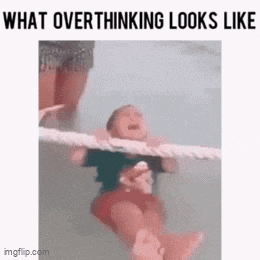 a person is hanging from a rope in a pool with the caption `` what overthinking looks like '' .