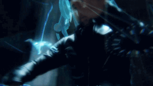 a blurry picture of a person with a glowing object in the background
