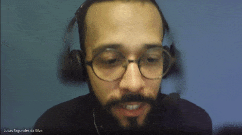 a man wearing glasses and headphones with the name lucas fagundes da silva on the bottom right