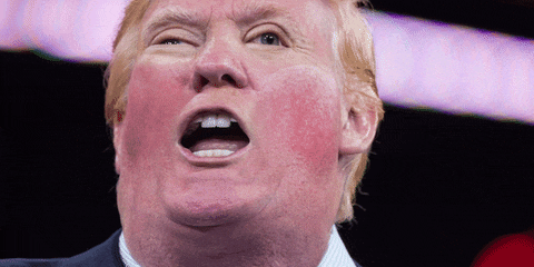 a close up of donald trump making a funny face