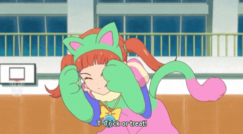 a girl in a cat costume is saying trick or treat