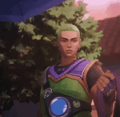a man with green hair is wearing a purple and green vest