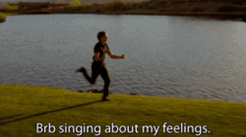 a man is running in front of a lake with the words brb singing about my feelings