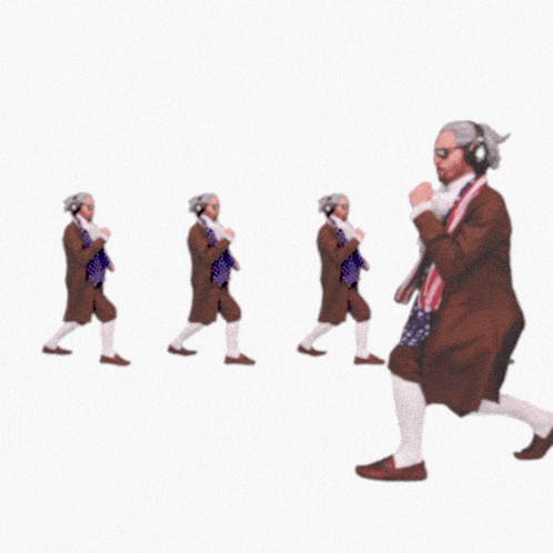 a man wearing headphones is dancing in a line with other men