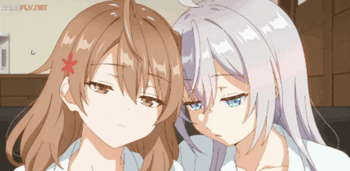 two anime girls are looking at each other with animeflv.net at the bottom