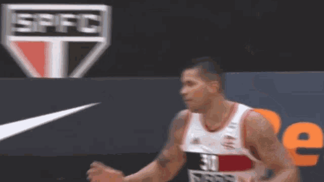 a man in a basketball uniform with the number 30 on it