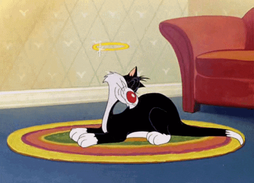 a cartoon cat laying on a rug with a ring in the air