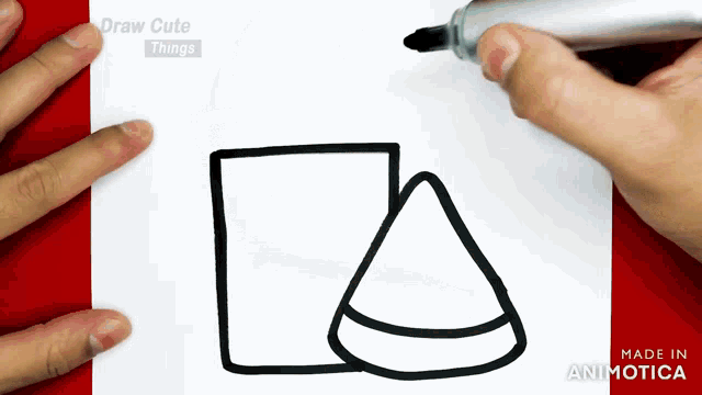 a person is drawing a square and a triangle with a marker